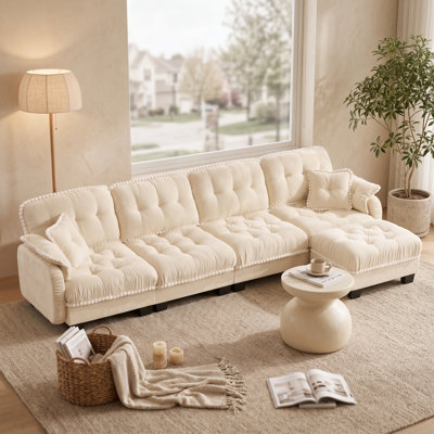 Canapé nuage 4 places beige crème en chenille avec pouf amovible, coussins capitonnés et finitions à pompons