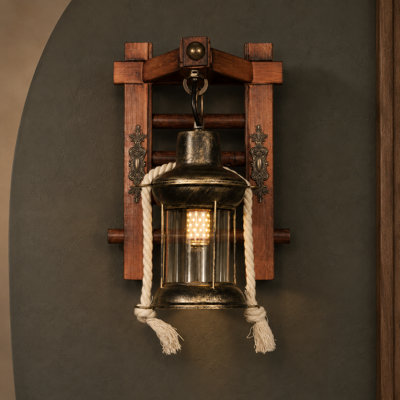Applique murale rustique de style ferme, en bronze antique, de 23 cm (9 pouces), avec support en bois et abat-jour en verre transparent orné d'une cordelette décorative.