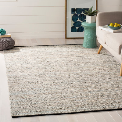 Tapis beige en cuir Exley