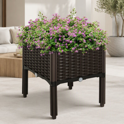 Lit surélevé avec pieds surélevés, jardinière avec bac à fleurs et plantes, brun