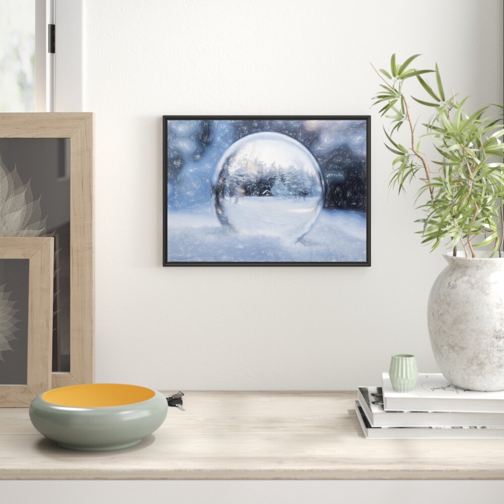 Gerahmtes Wandbild Eiskugel Winterlandschaft