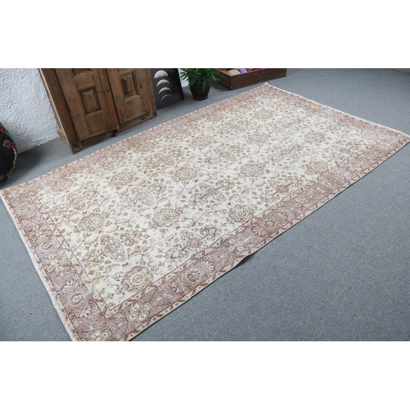 Le tapis turc Oushak fait à la main ajoute une touche unique au décor de votre bureau personnel ou de votre salon