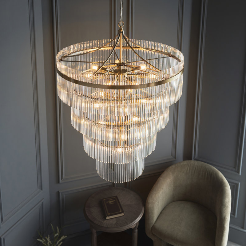 Geira 16lt Tiered Pendant light finished in Ant. Brass