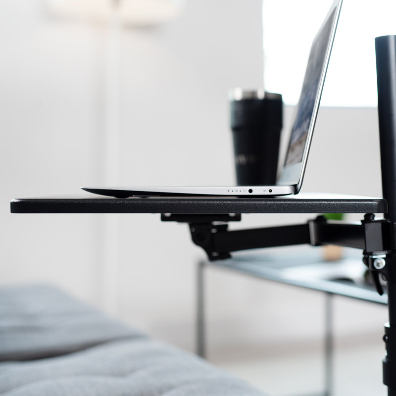 Le support de plancher noir Vivo peut supporter jusqu'à 11 lb.