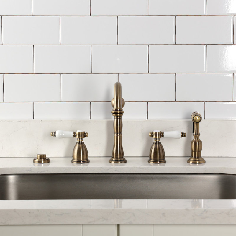 Kingston Brass Bel-Air Double-Handle Widespread Kitchen Faucet, With Side Spray, Antique Brass