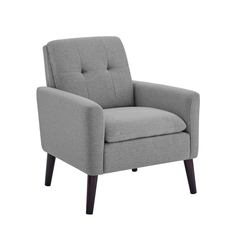 Fauteuil capitonné et rembourré