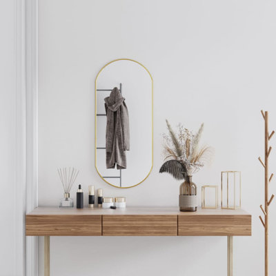 Wandspiegel Kluk Oval aus Kunststoff