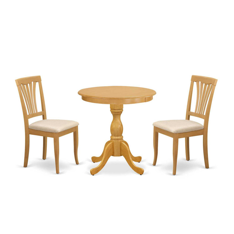L'ensemble de salle à manger 3 pièces comprend une table ronde avec piédestal et 2 chaises rembourrées en tissu de lin, chêne