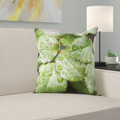 Coussin de jeté rose