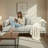 Modern Upholstered Sofa with Deep Cushions and Multiple Throw Pillows