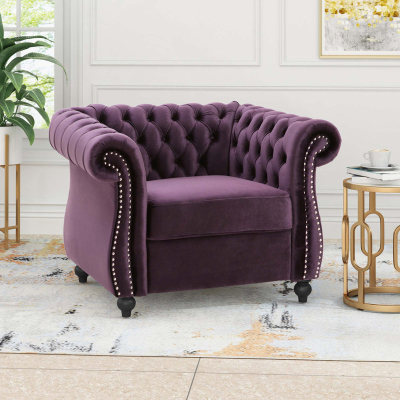 Fauteuil club traditionnel Chesterfield avec capitonnage à boutons profonds, accoudoirs roulés et garnitures cloutées