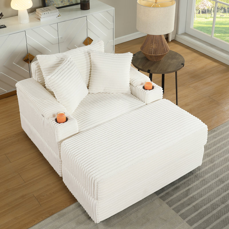 Fauteuil Comfy 1 avec coussins décoratifs, revêtement en velours côtelé, soutien optimal, design ergonomique, montage rapide, beige, assise profonde, à ressorts, idéal pour la détente.