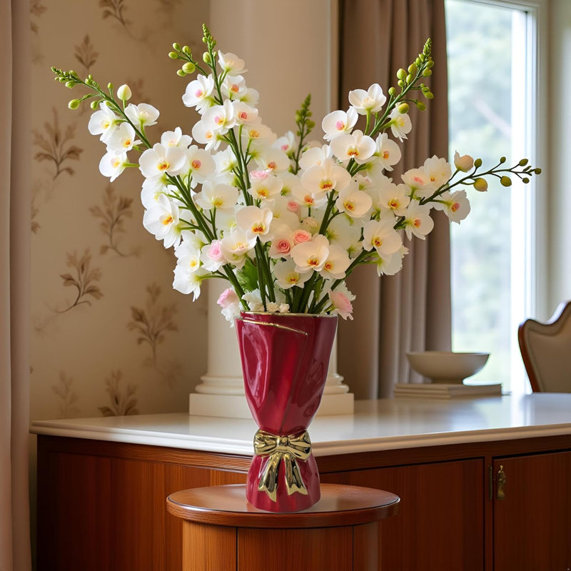 Vase en forme d'arc