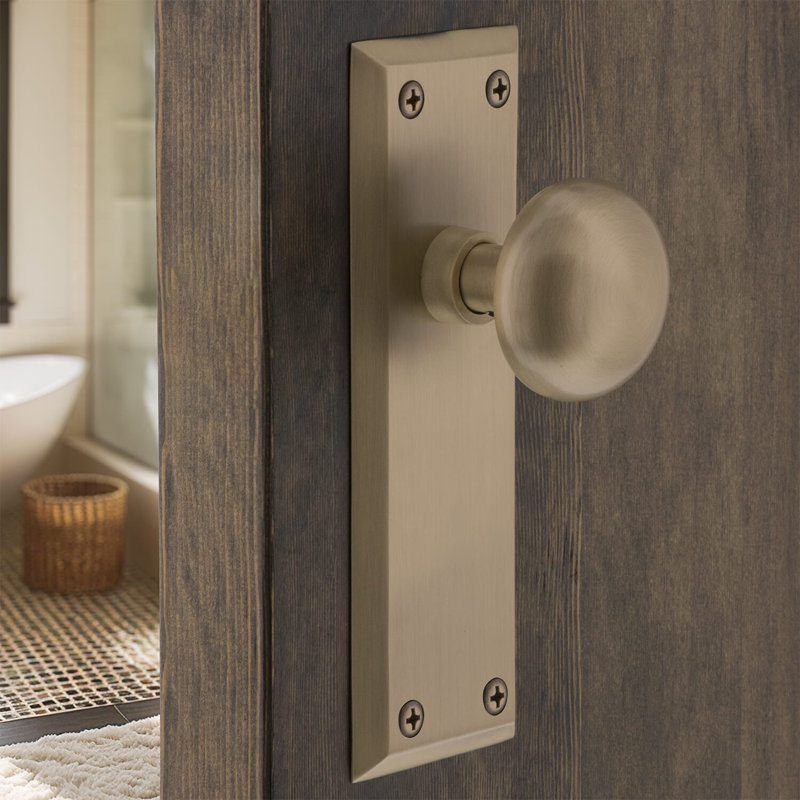 New York Plate with New York Door Knob, Antique Brass