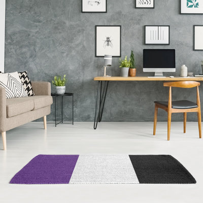 Tapis mauve rayé/noir de zone