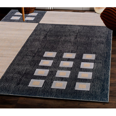 Tapis géométrique noir / crème Carina