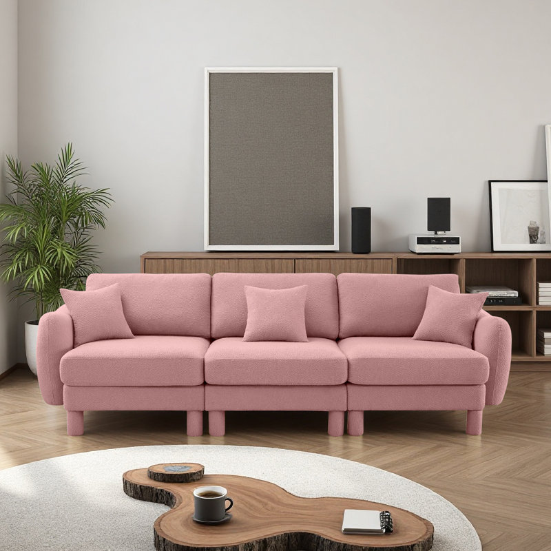 Canapé à 3 places en tissu Boucle avec accoudoirs distinctifs en forme de coquillage, pieds cylindriques enveloppés de tissu d'ameublement