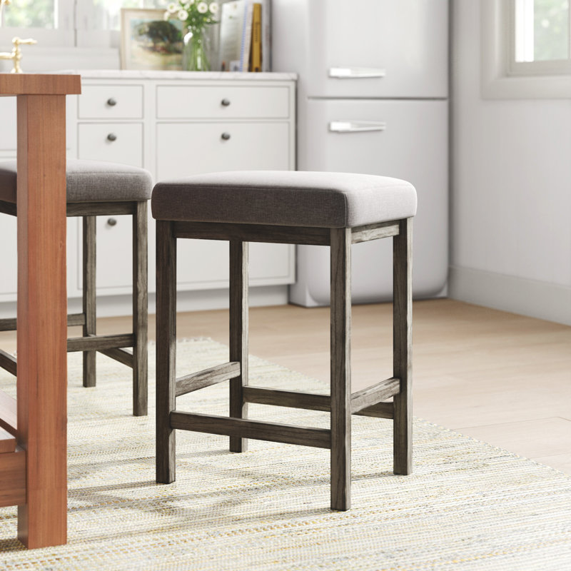 Tabouret de comptoir rembourré avec patins Tanner