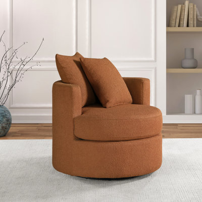 Fauteuil pivotant rembourré orange brûlé avec ressorts ensachés et revêtement doux pour une ambiance chaleureuse et invitante dans les salons