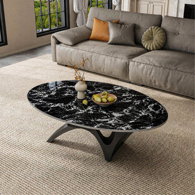 Table basse ovale moderne de 125 cm (49,2 po), plateau en pierre frittée imitation marbre, piètement minimaliste en métal sculptural, montage facile