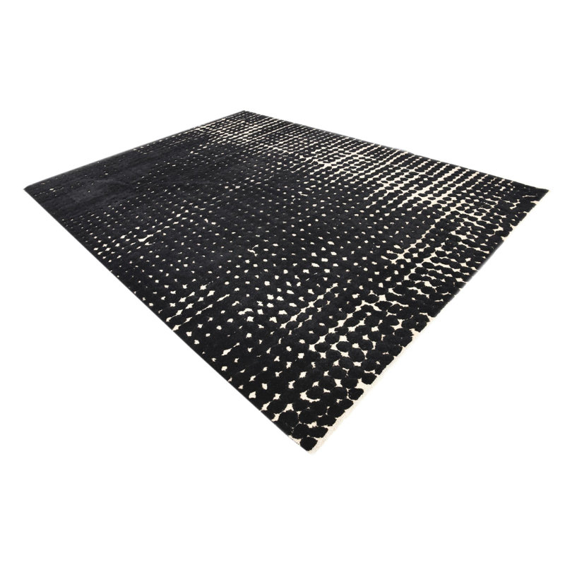 Tapis noir Iniguez