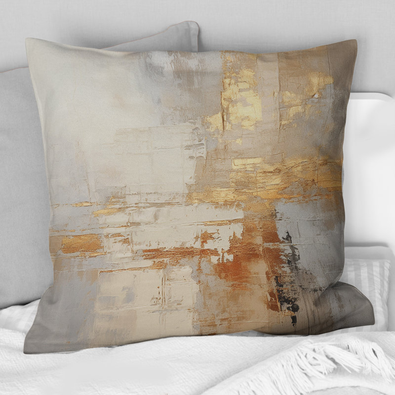 Coussin décoratif doré et blanc à motif abstrait