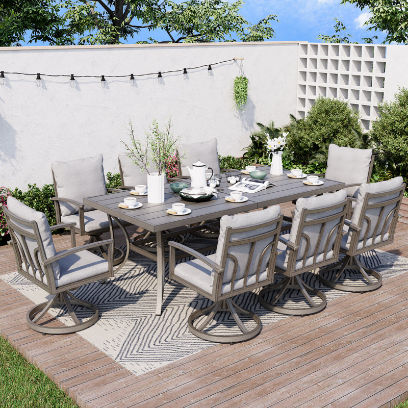 Freada 8 - Person Patio Dining Set Umbrella Hole Included Rectangular Table with Cushions Included
