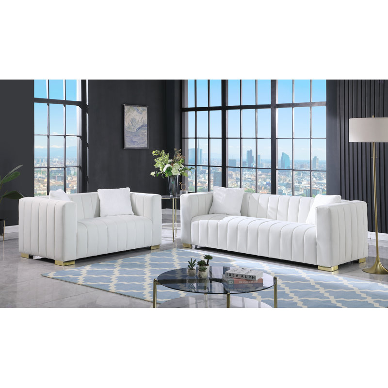 Un canapé-lit moderne sur un Chesterfield traditionnel, causeuse, Blanc