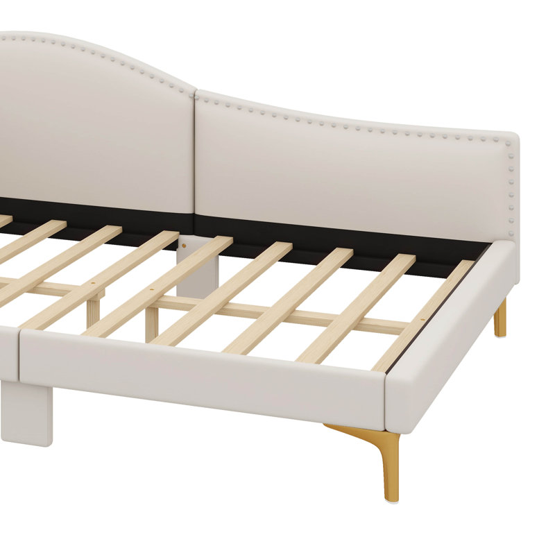 A Luxurious Upholstered Daybed With A Stylish Headboard And Comfortable Armrests, Beige