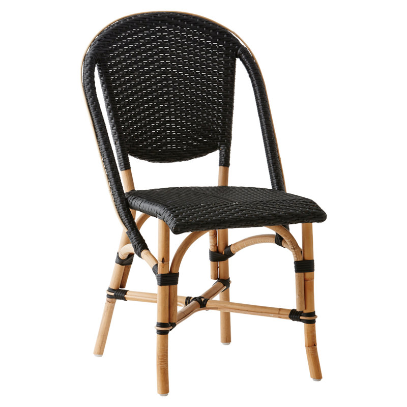 Chaise d'appoint en rotin Popplestone Sofie, Noir à pois blancs