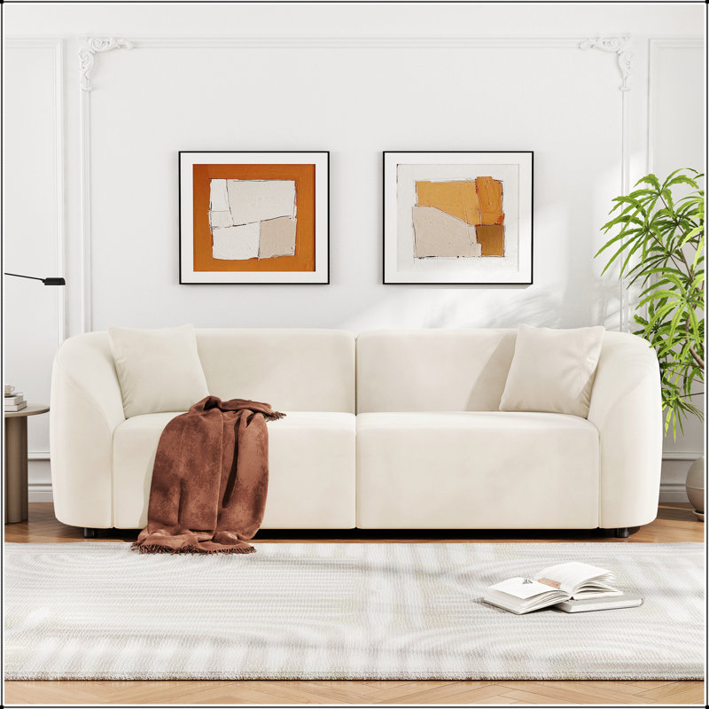 87 Canapé incurvé contemporain blanc cassé à conception moelleuse et durable pour des espaces élégants, Beige