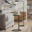 Table d'appoint ronde en métal avec plateau en marbre Cerro, finition bronze antique pour un décor moderne et peu encombrant