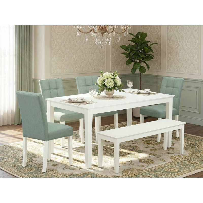 L'ensemble de table 6 pièces se compose d'une table en bois, d'un banc et de 4 chaises de salle à manger de style Mid-Century moderne en polyester vert saule, blanc lin