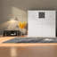 Grands lits escamotables blancs avec armoires supérieures, peu encombrants, style moderne
