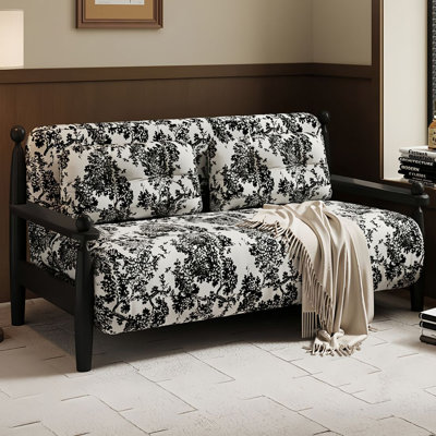 Canapé convertible noir et blanc à motif floral en jacquard
