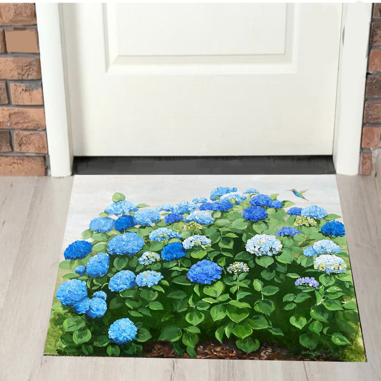 https://assets.wfcdn.com/im/64904839/compr-r85/2308/230873084/elainna-blue-hydrangeas-door-mat.jpg