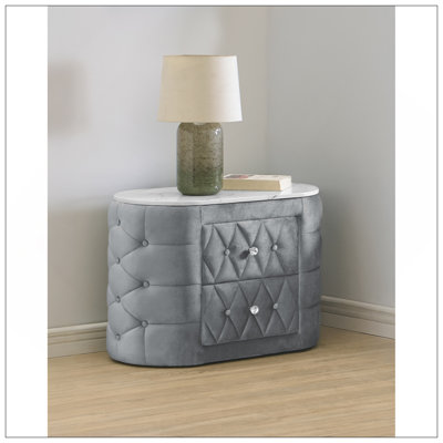 Élégante table de chevet avec dessus et deux tiroirs de rangement, parfaite pour décorer et organiser une chambre à coucher moderne.