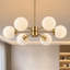 Lustre spoutnik moderne à 6 lumières à intensité variable avec globes de verre dorés-47907827-46312283
