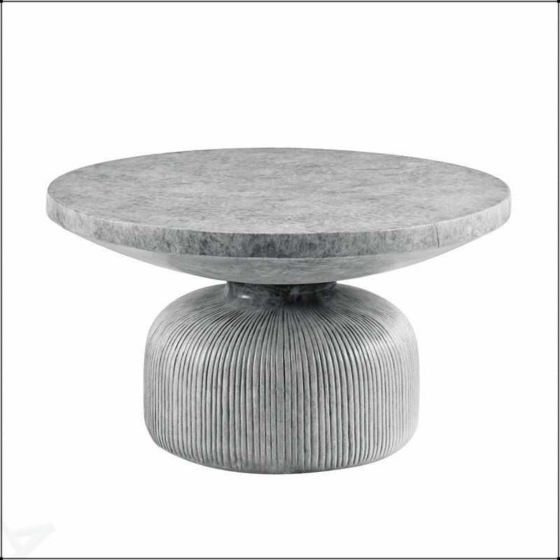 Table basse ronde à finition grise Laddie, parfaite pour les petits espaces et les intérieurs modernes