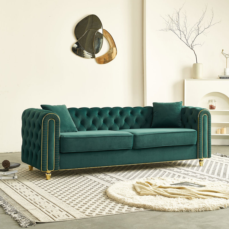 Canapé capitonné avec 2 coussins décoratifs