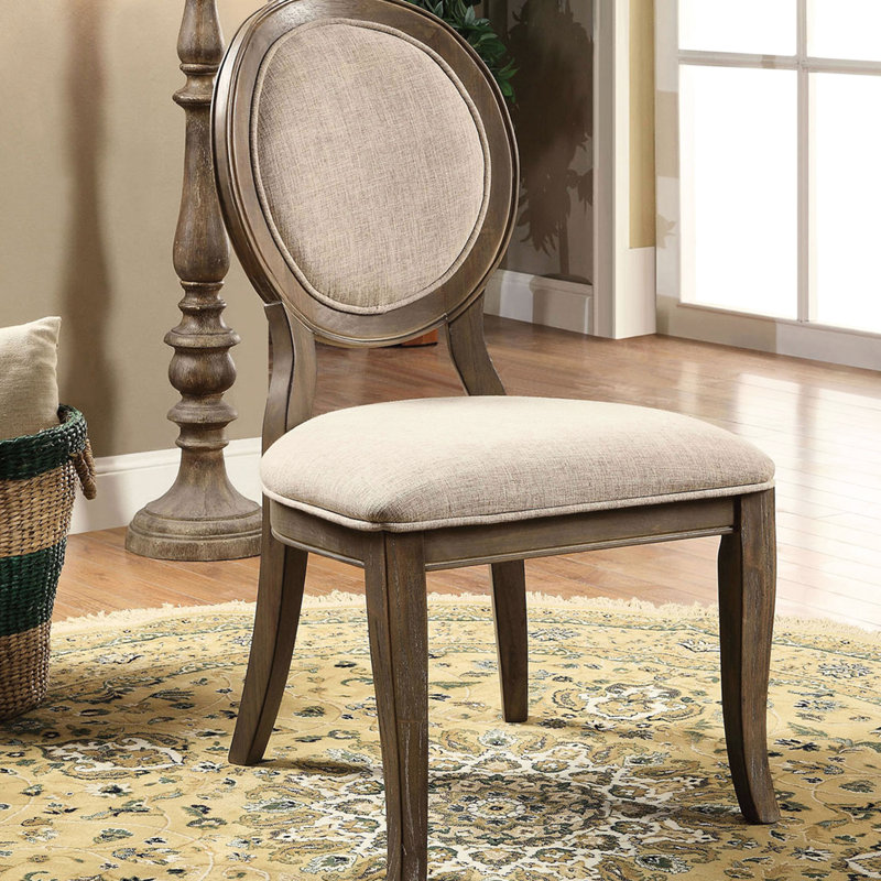 De 2 chaises de salle à manger au fini chêne rustique, rembourrées en tissu, dossier ovale pour un look élégant et moderne