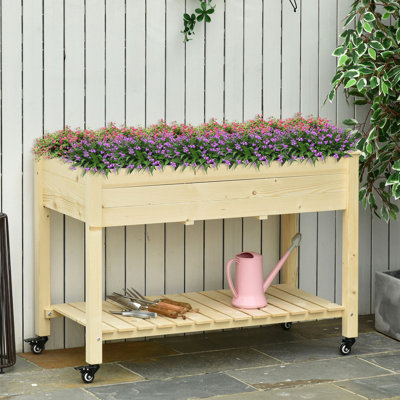 Lit de jardin surélevé, 47 po x 22 po x 33 po, jardinière en bois surélevée avec roues verrouillables, tablette de rangement et doublure de lit pour la cour, le patio