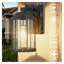 Applique murale extérieure en aluminium noir avec verre bullé, indice de protection IP44.