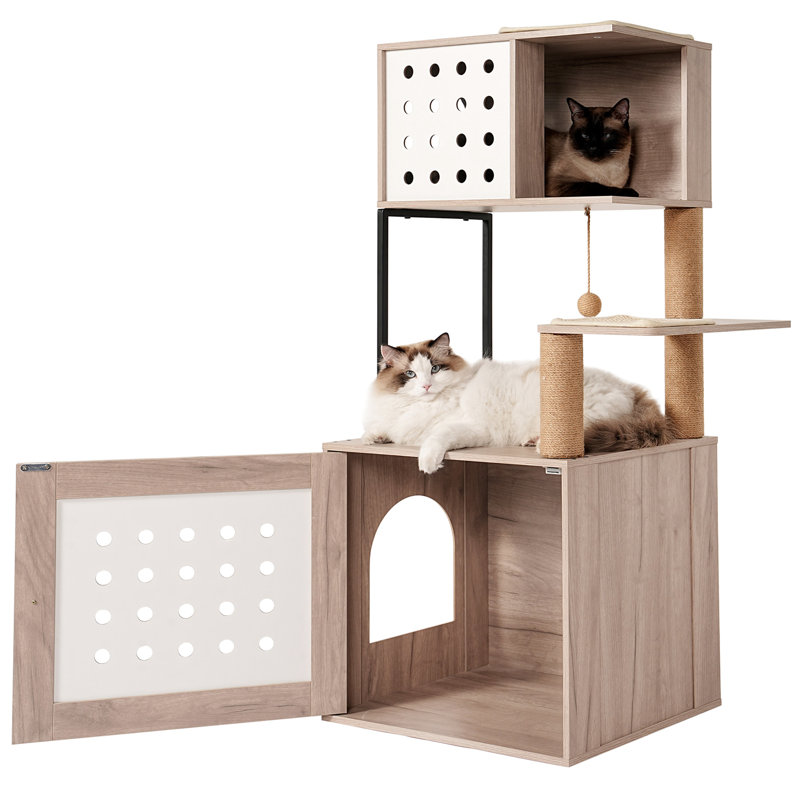 Arbre à chat d'intérieur comprenant un bac à litière gris et blanc, un grand couchage, un espace nourriture et des poteaux à griffer, dans une tour au style décoratif moderne pour animaux de compagnie.