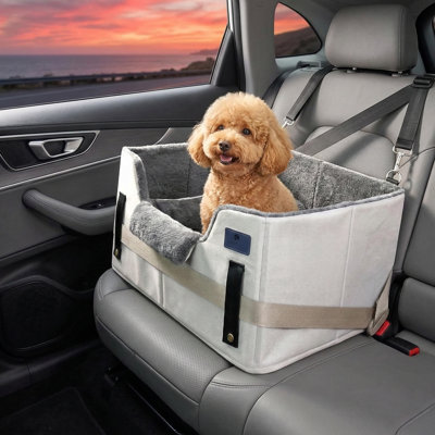 2-in-1 convertible dog car seat and pet bed; portable booster design suitable for medium to small dogs; features safety leash, non-slip bottom, and removable machine-washable cover.