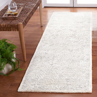 Tapis floral ivoire / gris en coton / laine / coton touffeté à la main Bateh