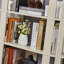Bibliothèque ovale en bois ouverte, bibliothèque autoportante à cadre en panneau de fibres à densité moyenne, support de rangement à 5 niveaux facile à assembler pour le salon, décoration de bureau à domicile