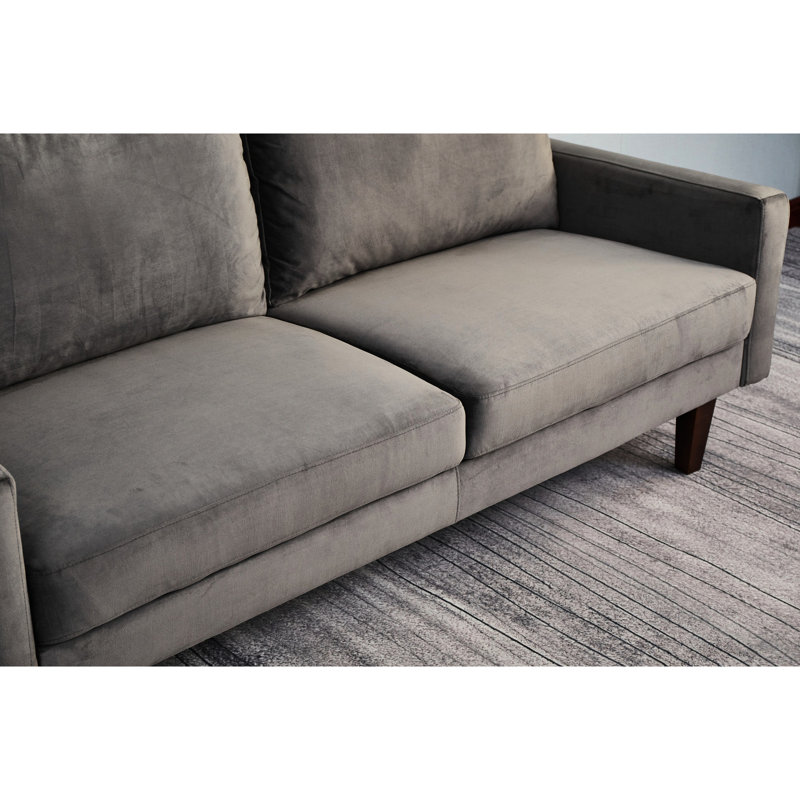 Faites l'expérience du confort en gris: rembourrage en mousse, revêtement en microfibre douce, coussin d'assise à base en bois robuste, pieds et pieds luxueux