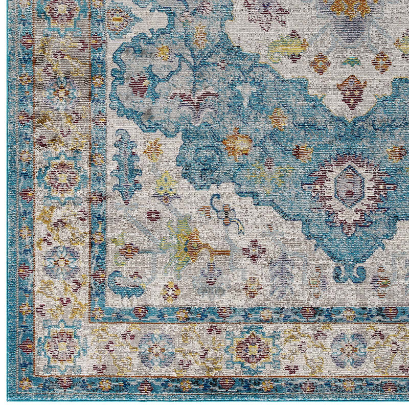 Light Blue and Ivory Floral Synthetic 4' x 6' Area Rug