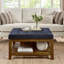 Grande table basse rembourrée en lin capitonné avec tablette en bois de hêtre-408961283
